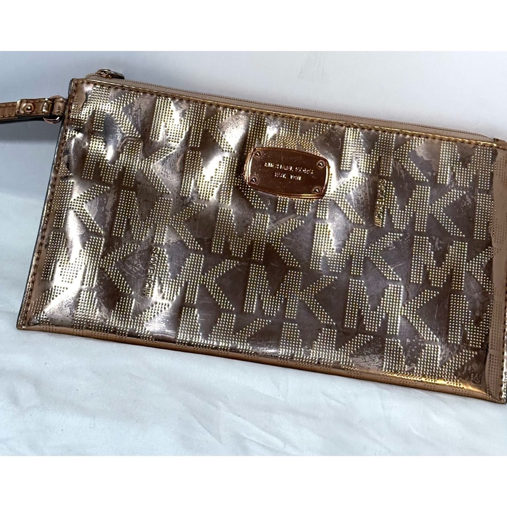 Michael Kors wristlet rose gold